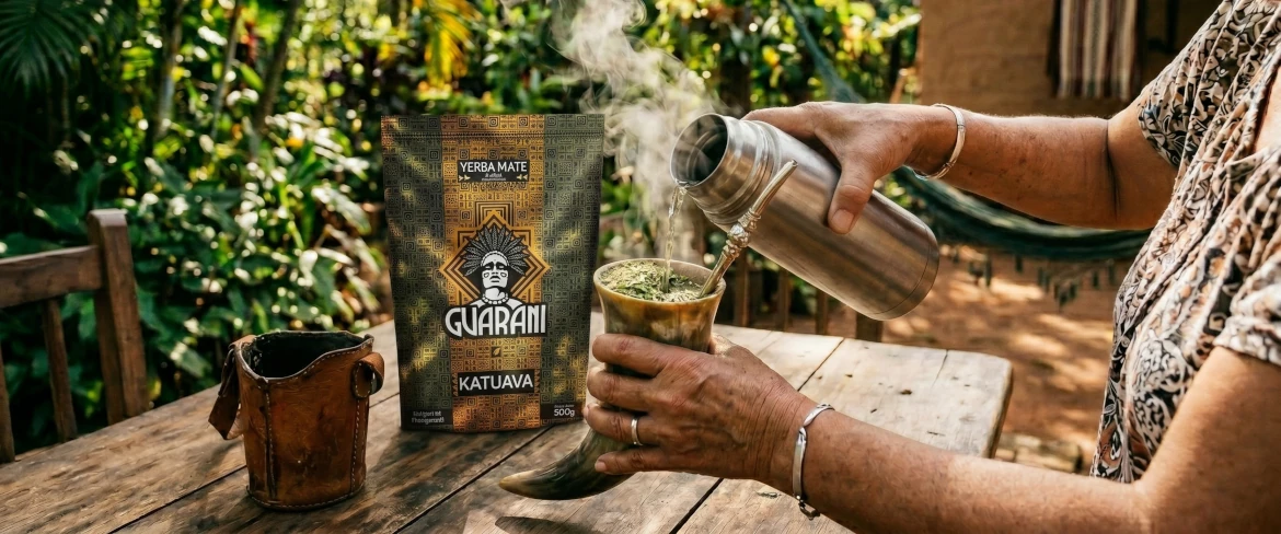 Paraguayan yerba mate prepared hot – pouring water over mate Paraguay leaves