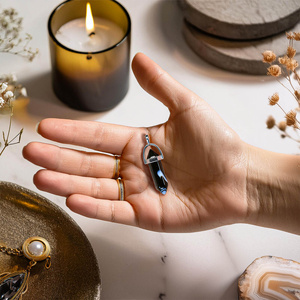 Pendant with black agate in pouch + chain